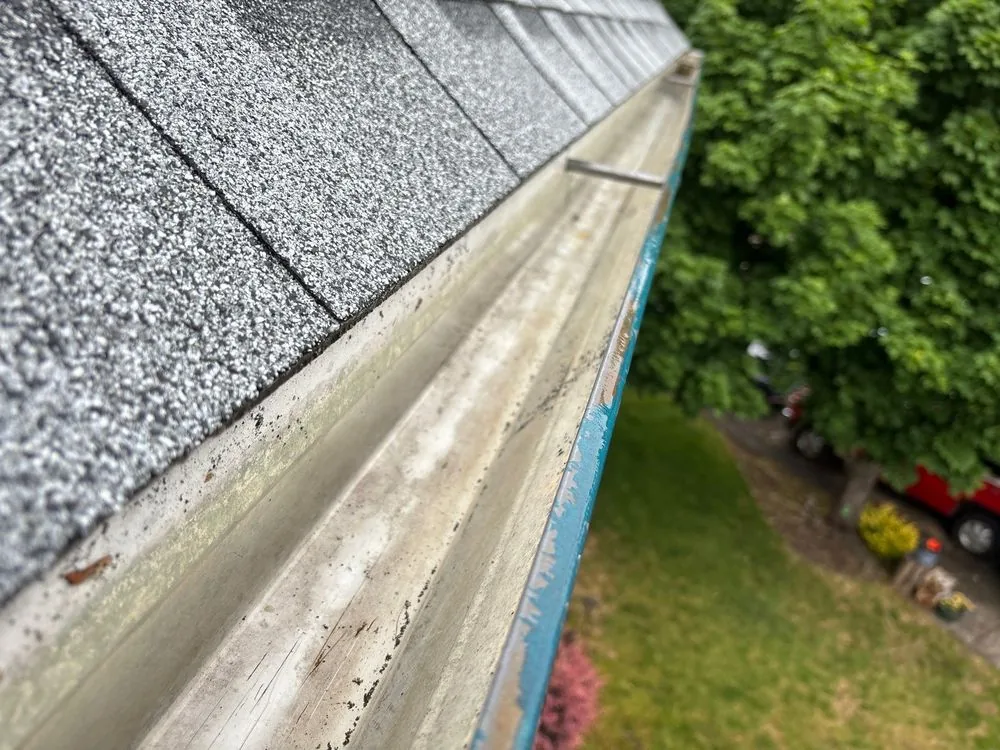 Clean metal gutter after residential gutter cleaning